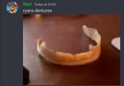 Stan joking about Ryan's dentures in the PebbleHost Mousepad unboxing video.